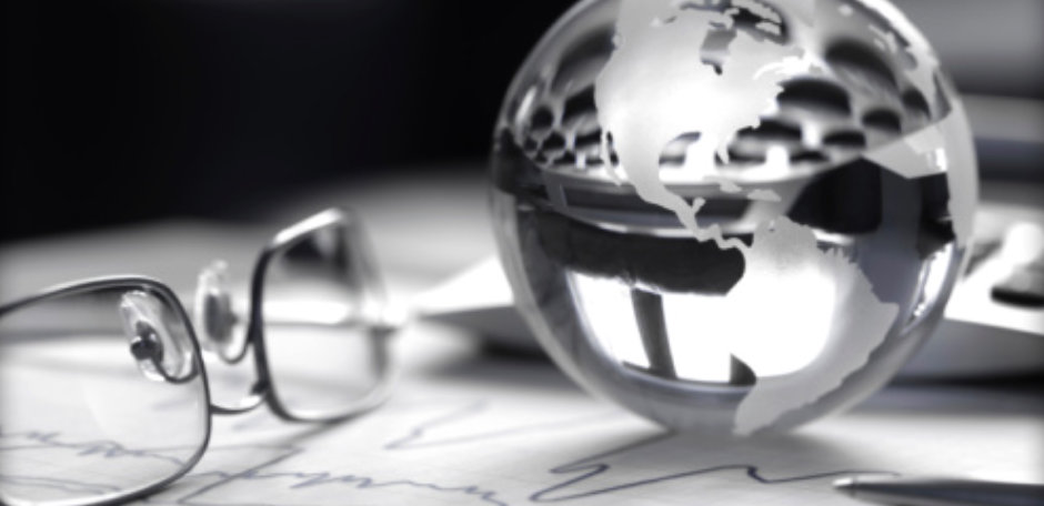 eye glasses and a crystal globe